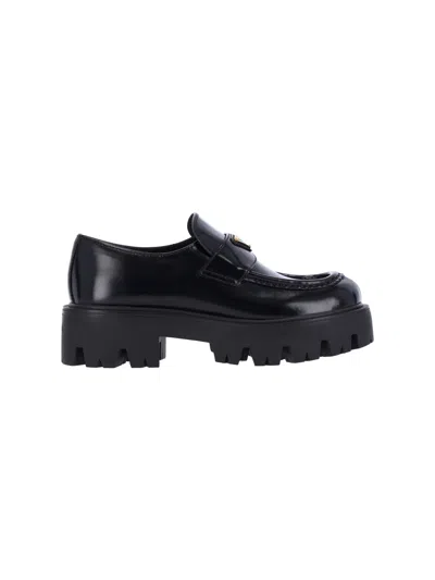 Prada Brushed Leather Loafers In Black