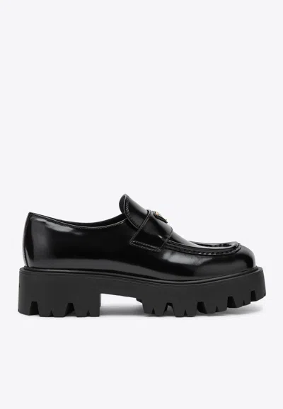 Prada Brushed Leather Loafers In Black