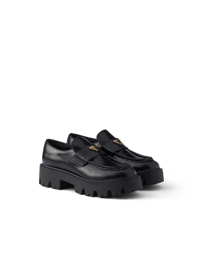 Prada Brushed Leather Loafers In Black