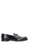 Prada Triangular Plaque Loafers In Black