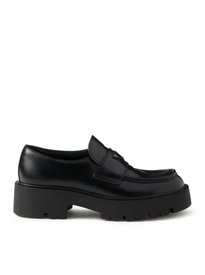 Prada Brushed Leather Loafers In Black