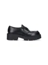 Prada Monolith Brushed Leather Loafers In Black  