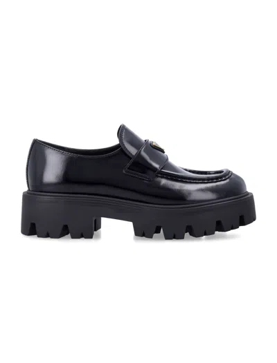 Prada Brushed Leather Loafers With Enameled Triangle Logo And 50 Mm Monoblock Rubber Sole In Black