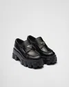 Prada Logo Plaque Spazzolato Leather Platform Moccasins In Black