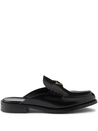 Prada Brushed Leather Mules In Black