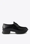 Prada Brushed Leather Squared-toe Loafers In Black