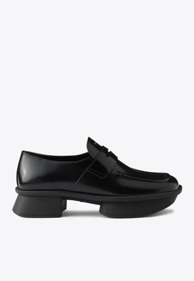 Prada Brushed Leather Platform Loafers In Black