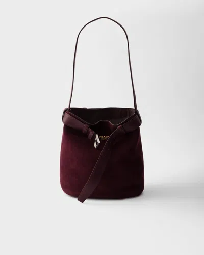 Prada Buckle Belted Suede Bucket Bag In Burgundy