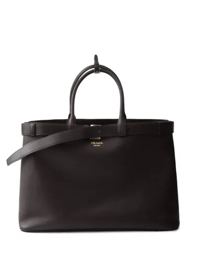 Prada Buckle Leather Tote Bag In Braun