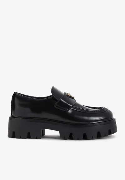 PRADA CALF LEATHER FLATFORM LOAFERS