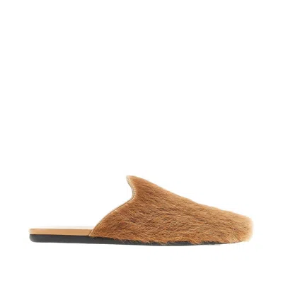 Prada Calfhair Mules In Brown