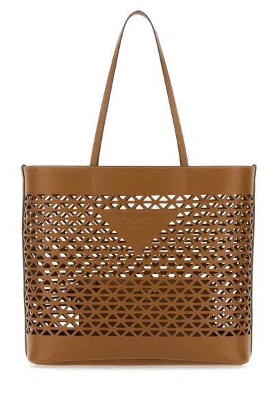 Prada Leather Shopping Bag Featuring Cut-out Detailing In Beige O Tan