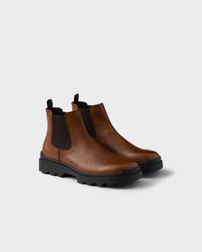 PRADA STAMPED LEATHER CHELSEA BOOTS
