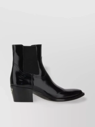 Prada Streamlined Leather Ankle Boots In Black