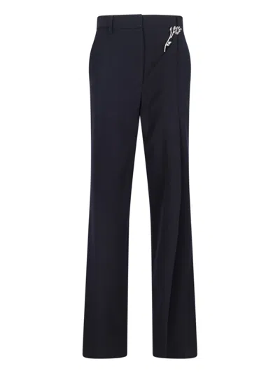 PRADA CHINOS WITH FLORAL CHARM