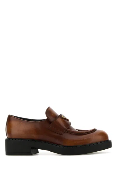Prada Triangle-logo Leather Loafers In Brown