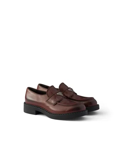 Prada Chocolate Aged Leather Loafers In Brown
