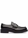 Prada Triangle Logo Brushed Leather Loafers In Black