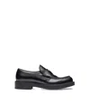Prada Round-toe Loafers In Black