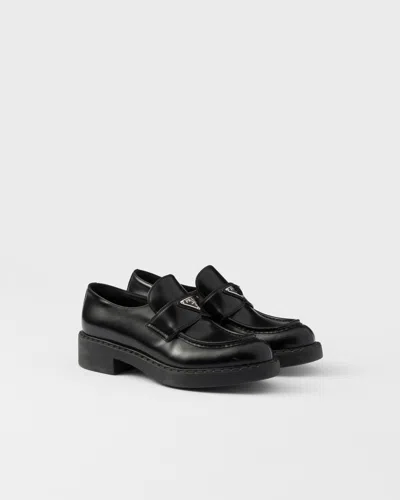 Prada Brushed Leather Loafers In Black