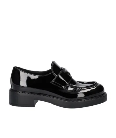 Prada Brushed Leather Loafers In Black