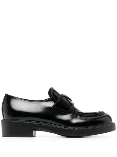 Prada Triangle Logo Patent Leather Loafer In F0002 Black