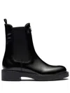 Prada Logo Plaque Brushed-effect Ankle Boots In Black