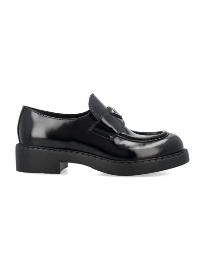 Prada Chunky Brushed Leather Loafers With Enamel Triangle Logo In Nero