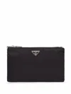 Prada Logo Plaque Zipped Wallet In Black