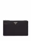 Prada Logo Plaque Zipped Wallet In Black