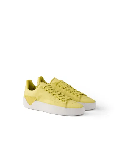 Prada Court Re-nylon Sneakers In Yellow
