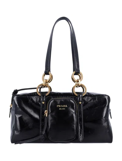Prada Dangle Medium Leather Top-handle Bag In Black