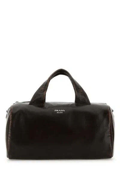 Prada Dark Brown Nappa Leather Small Travel Bag In Moro