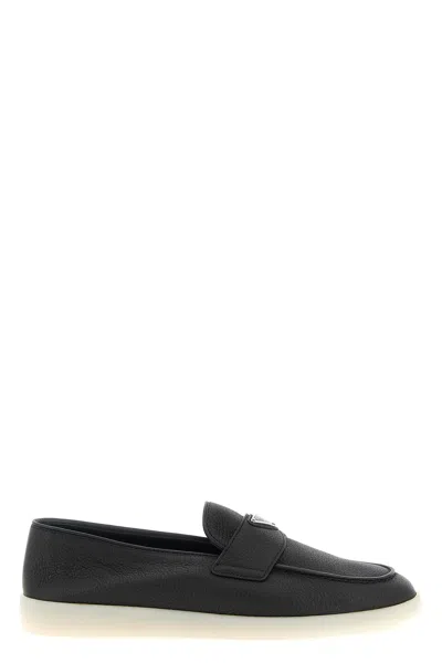 Prada Logo-plaque Pebble-grain Loafers In Black