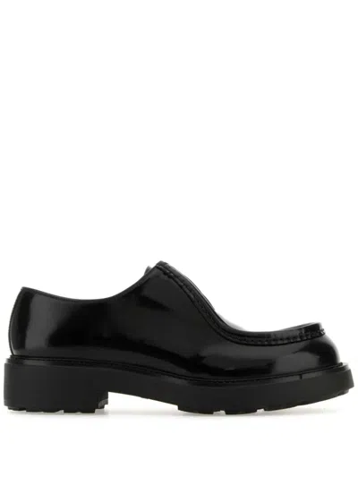 Prada Leather Lace-up Shoes With Chunky Sole And Logoed Rubber Inserts In Black