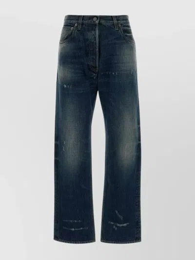 PRADA DISTRESSED FIVE-POCKET DENIM TROUSERS