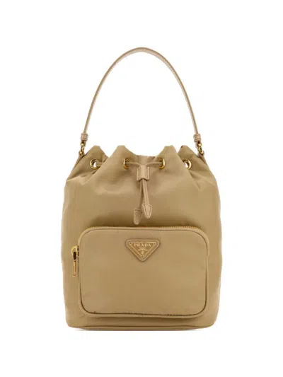 Prada Re-nylon Triangle-logo Drawstring Bucket Bag In Nude