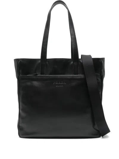 Prada Embossed-logo Shoulder Bag In Black
