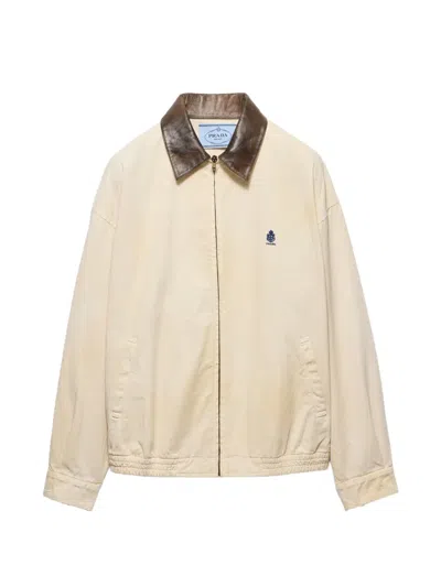PRADA EMBROIDERED GARMENT-DYED OLD GABARDINE BLOUSON JACKET
