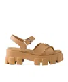 Prada Enamel Triangle-logo Sandals In Barley Color
