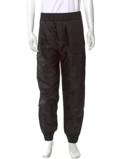 Pre-owned Prada Enameled Metal Triangle Joggers In Black