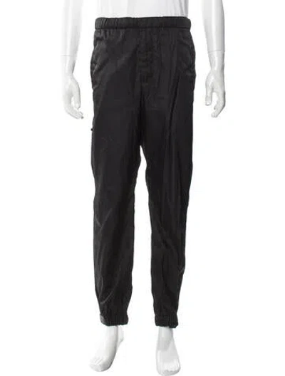 Pre-owned Prada Enameled Metal Triangle Joggers In Black