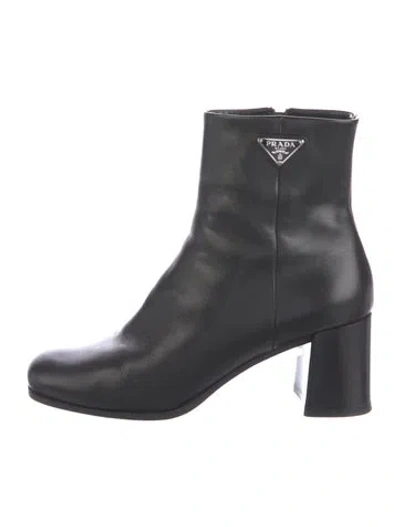 Pre-owned Prada Enameled Metal Triangle Leather Boots In Black
