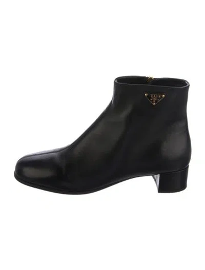 Pre-owned Prada Enameled Metal Triangle Leather Boots In Black