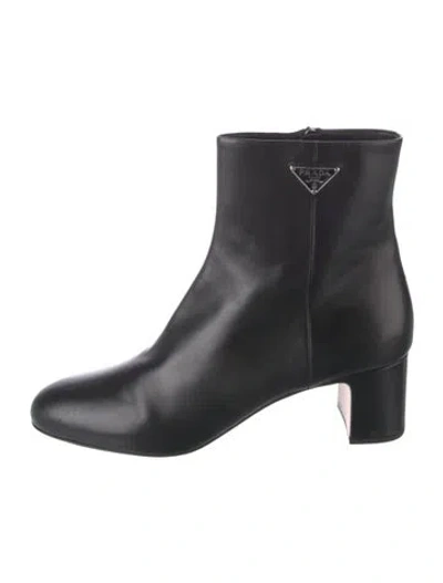 Pre-owned Prada Enameled Metal Triangle Leather Boots In Black