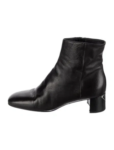 Pre-owned Prada Enameled Metal Triangle Leather Boots In Black