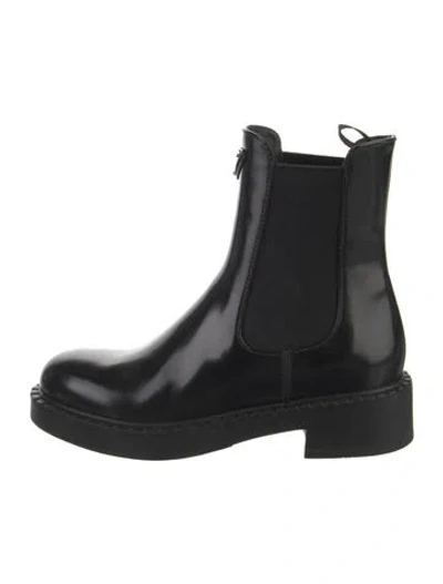 Pre-owned Prada Enameled Metal Triangle Leather Chelsea Boots In Black