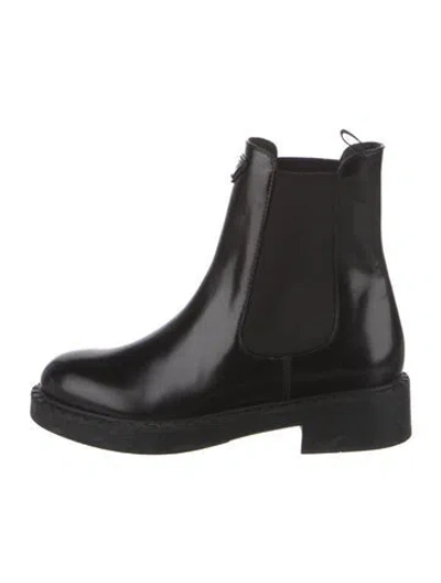 Pre-owned Prada Enameled Metal Triangle Leather Chelsea Boots In Black