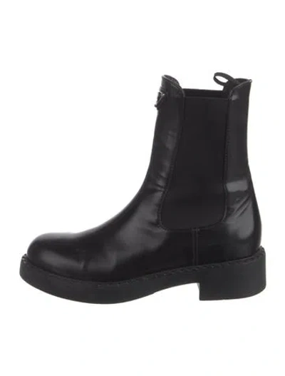 Pre-owned Prada Enameled Metal Triangle Leather Chelsea Boots In Black