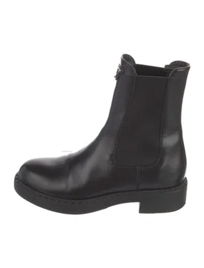 Pre-owned Prada Enameled Metal Triangle Leather Chelsea Boots In Black